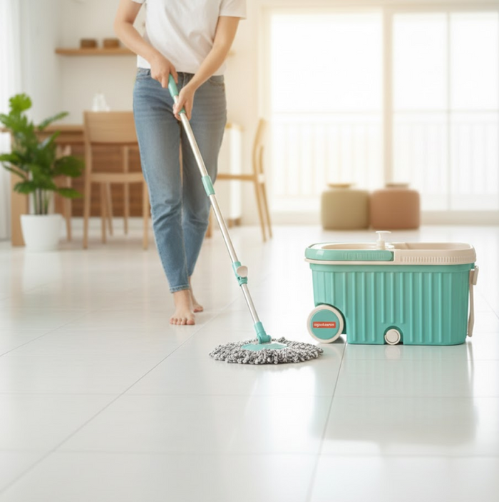 Ganesh spin mop bucket featuring a convenient drainage system for easy water disposal.
