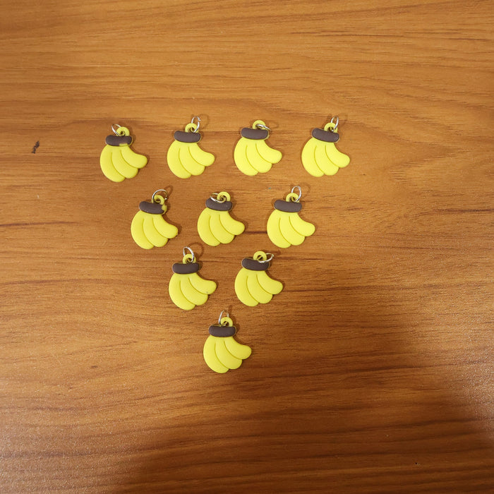 Assorted banana-shaped bag charms in set