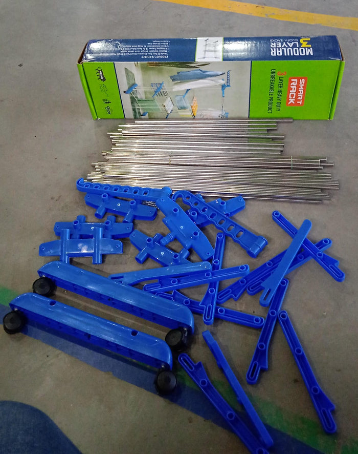 Compactly folded cloth drying rack, demonstrating its space-saving design.