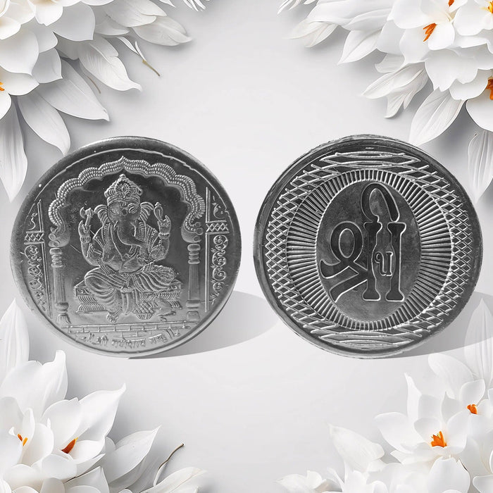 Hand holding the auspicious Decorative Ganesh Coin, ready for pooja or gifting.