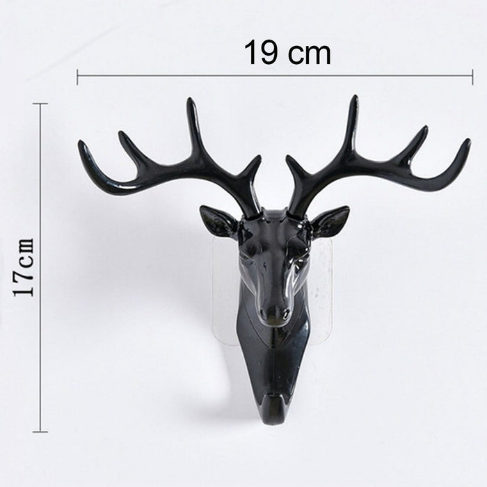 Stylish deer head hook in grey, functioning as a decorative hanger for a hat.