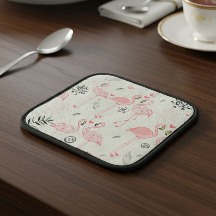 Printed pot holder mat in use on kitchen countertop protecting surface