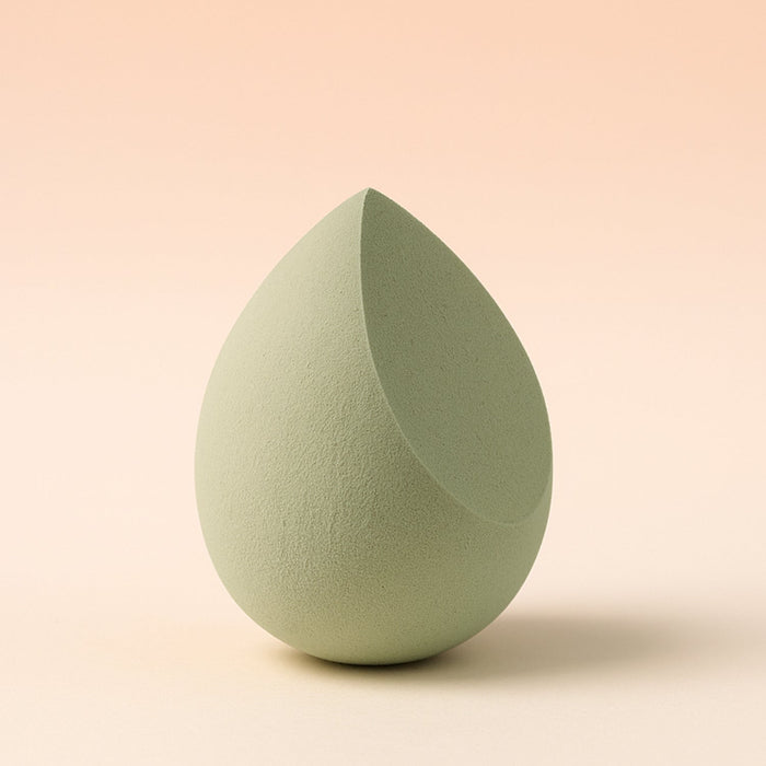 Close-up shot of the soft, non-latex texture of the BeautyBare makeup sponge.