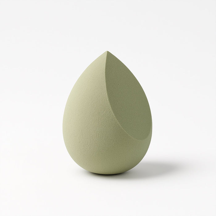 Demonstrating the soft, flexible texture and elasticity of the BeautyBare makeup sponge.