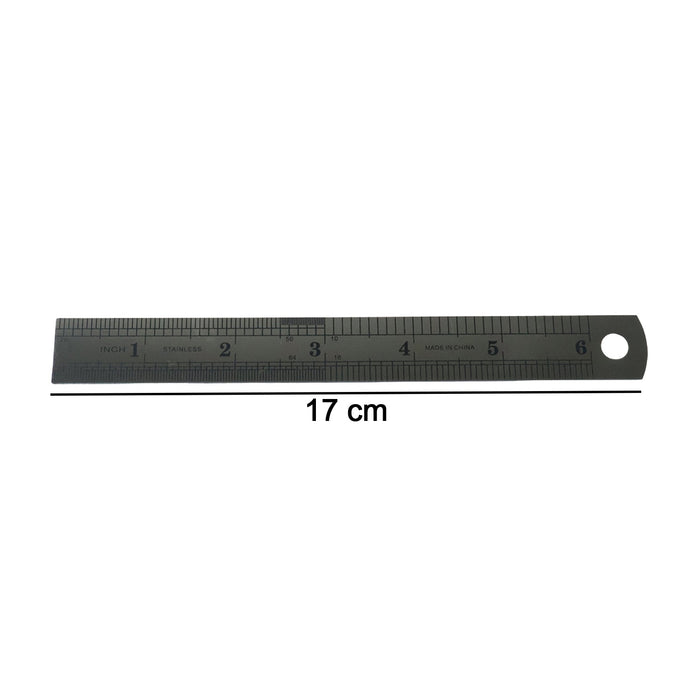 Close-up showing detailed markings on steel measuring ruler