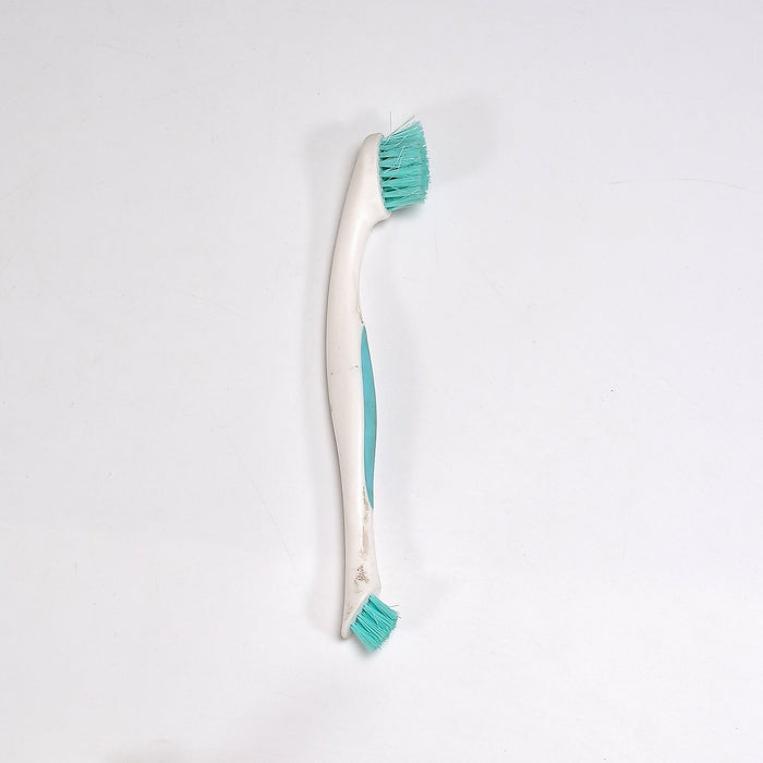 Back view of the Styleva dual-sided cleaning brush, highlighting its compact and practical design.