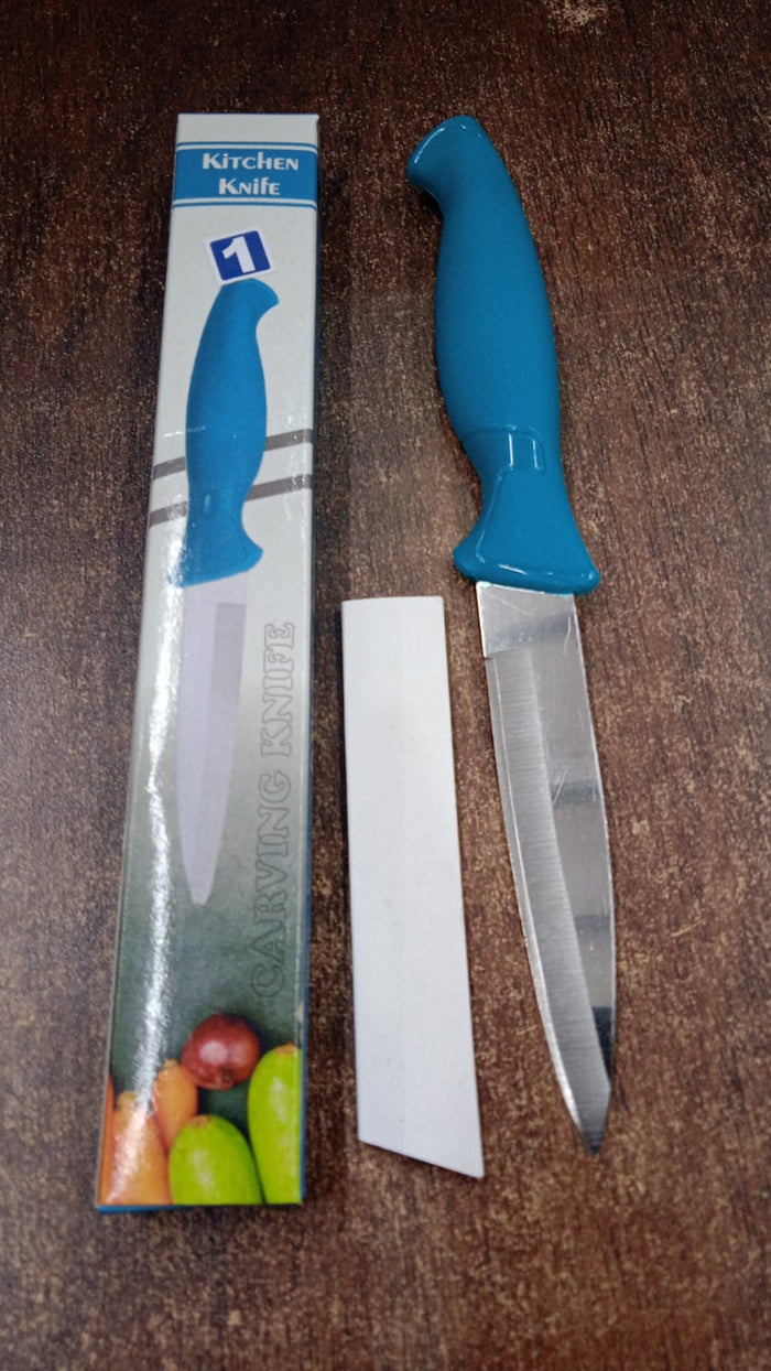 Detail of ergonomic plastic handle on multipurpose kitchen knife