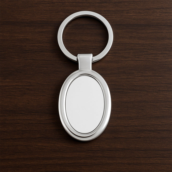 Sleek oval metal keychain showcasing durable build and chrome shine
