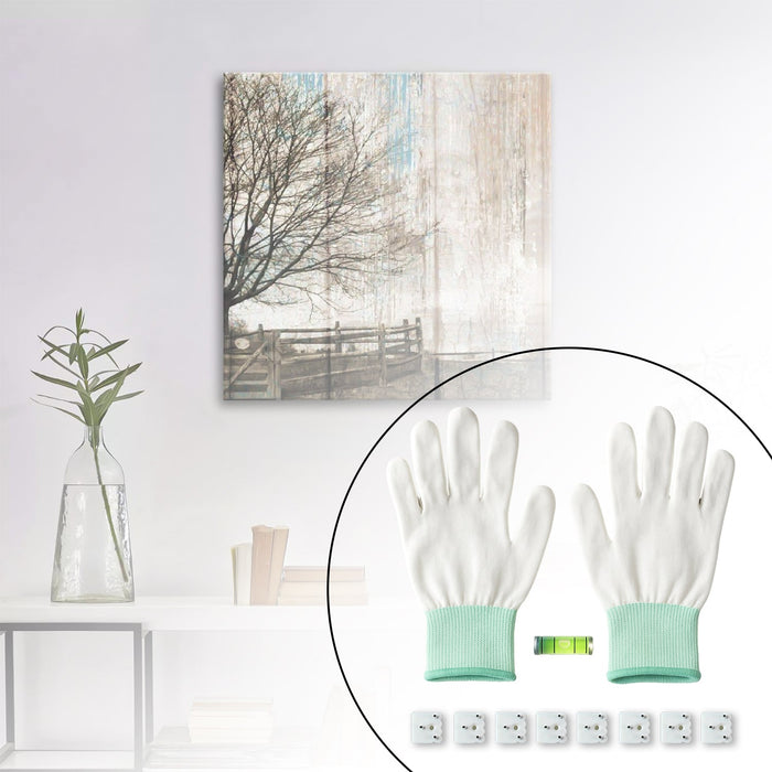 Contents of the picture hanging kit arranged on flat surface