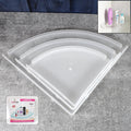 Three-piece white plastic corner shelf set displayed in a modern bathroom.