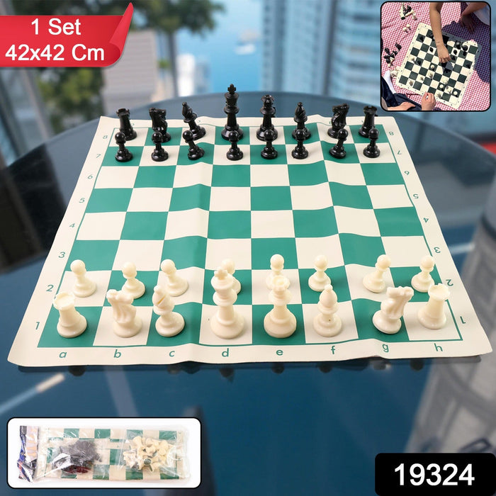 Rolled-up vinyl chessboard showing portability of chess set with plastic pieces