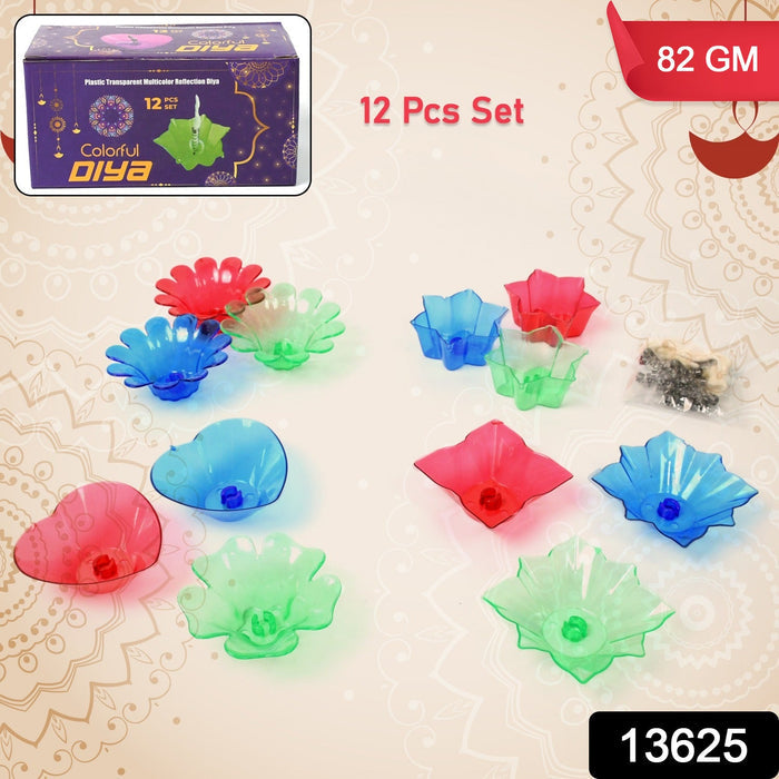 A 12-piece Reflection Diya Set showcasing various bright colours and shapes for festive use.