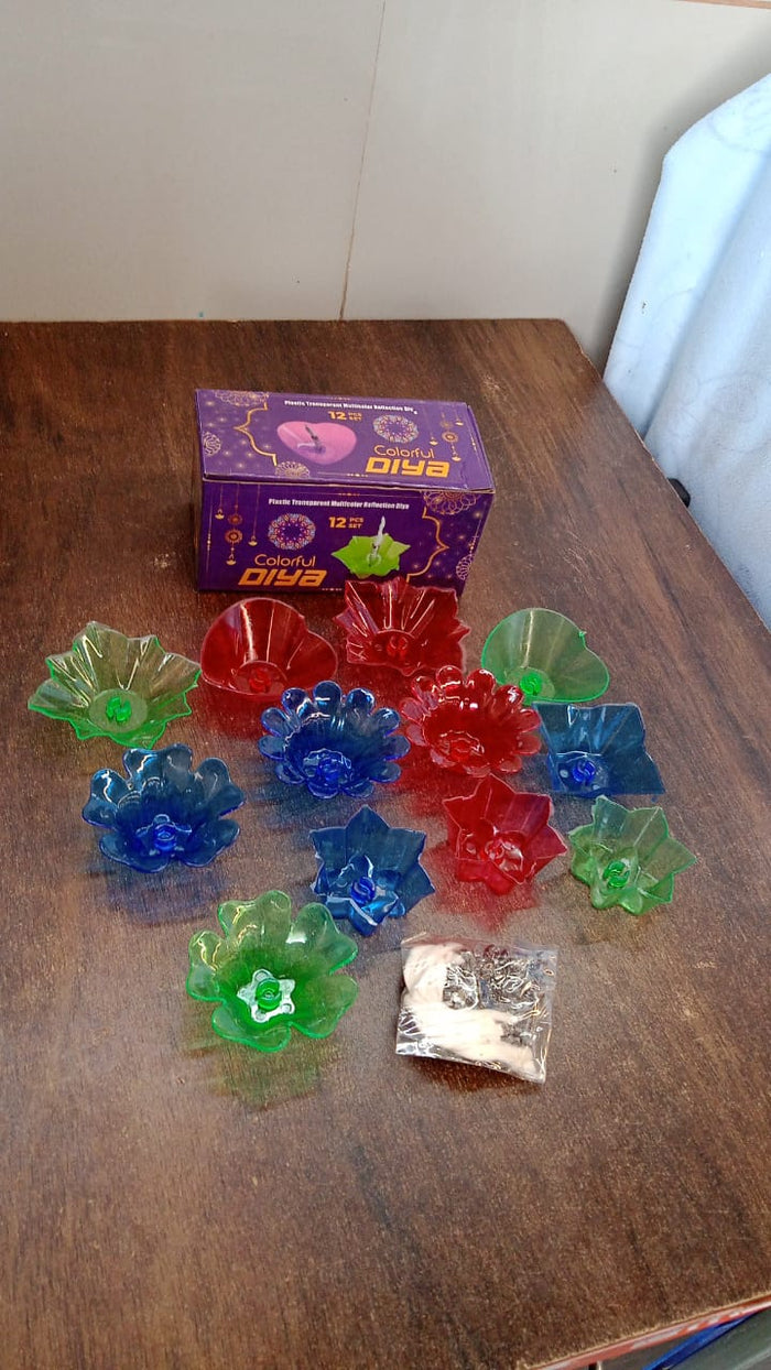 Arrangement of the multi-shape Reflection Diya Set creating a festive ambiance for celebrations.