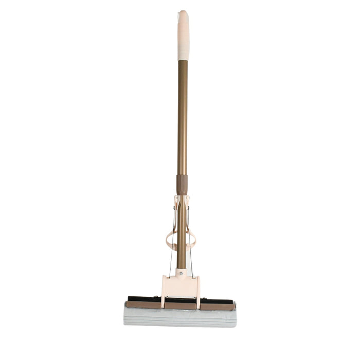 A user effortlessly cleaning a floor with the self-cleaning sponge mop, highlighting its maneuverability.