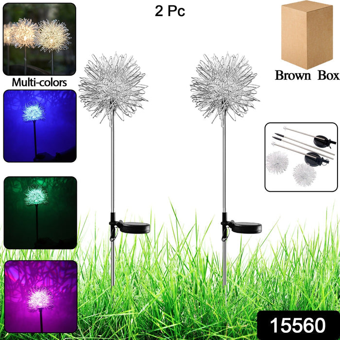 Solar color changing dandelion garden lights glowing in multicolor in outdoor garden