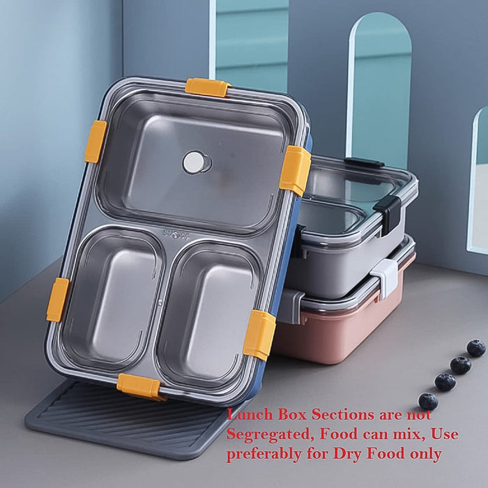 Complete stainless steel lunch box set with a spoon and chopsticks, ready for meals.