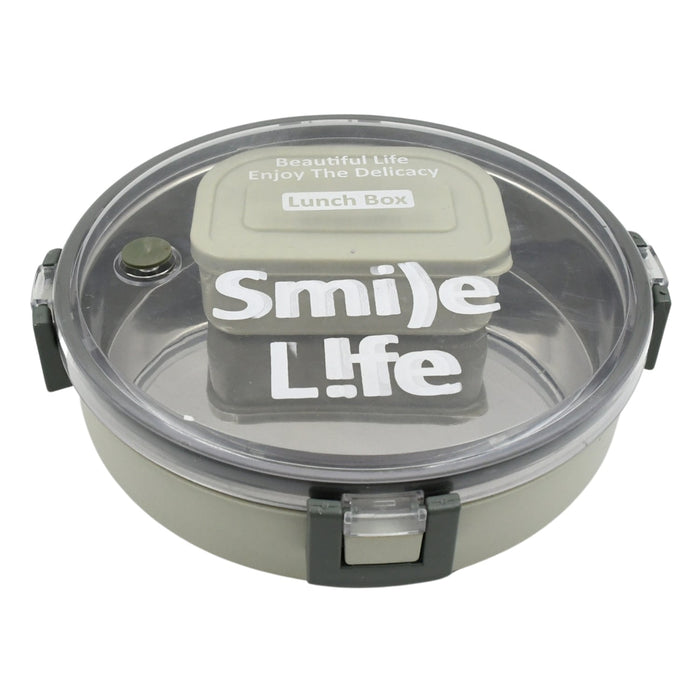 An adult holding the sleek Miracle Stainless Steel Lunch Box, ideal for office or school lunches.