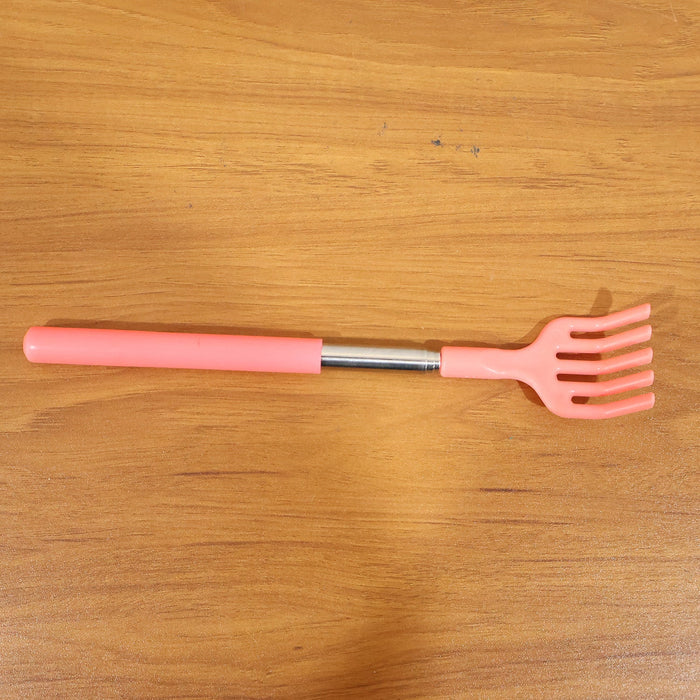 Khujli Stick back scratcher with its product packaging and included accessories.