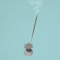 Set of four silver finish wall-mounted agarbatti holders for incense sticks